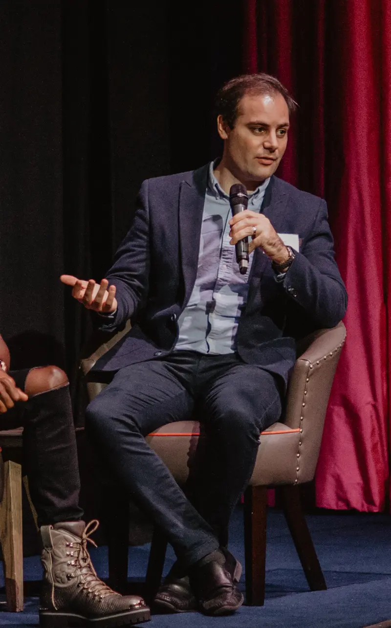 Ben Delo on stage at The Spectator's "Who's afraid of Bitcoin?" conference